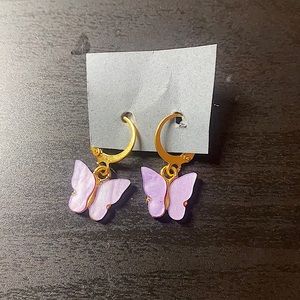 Homemade purple butterfly earrings
